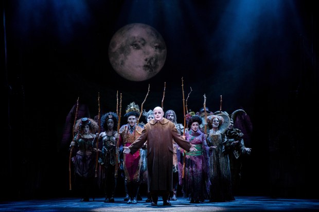 Les Dennis as Uncle Fester (centre) and the cast of THE ADDAMS FAMILY. Credit Matt Martin