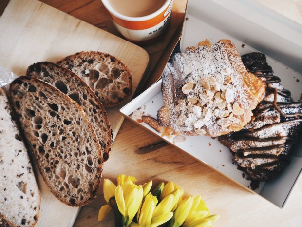 Pastry and freshly baked bread from The Hoxton Bakehouse, with tea and daffodils