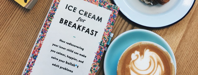 Laura Jane Williams's book, Ice Cream for Breakfast, on a coffee table with a coffee